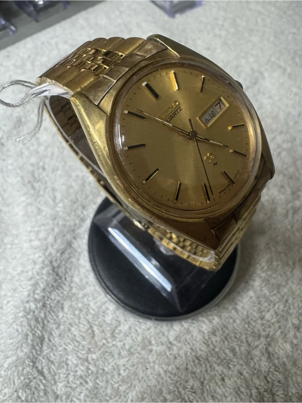 Seiko Gold Tone Quartz Watch with Day-Date